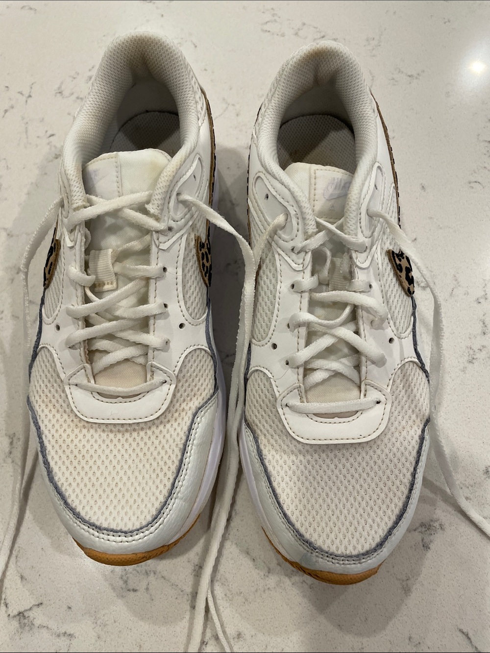 Nike White women wear Sneakers with Leopard Accent and Gum Outsole 7.5
